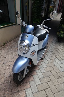 166303