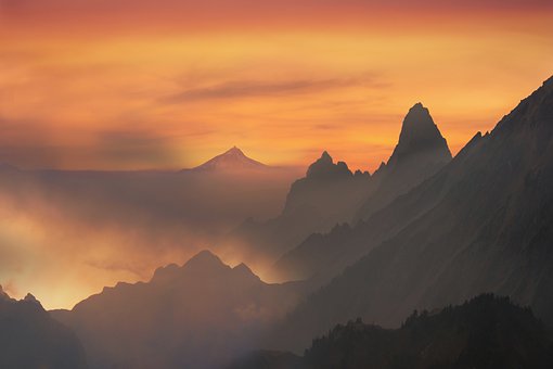 164011